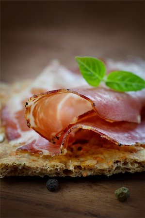 sliced ​​ham - Dried pork collar salami ham with herbs Stock Photo - Budget Royalty-Free & Subscription, Code: 400-06137814