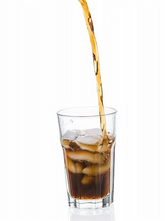 pouring soda - Coke splashing from glass isolated on white background Stock Photo - Budget Royalty-Free & Subscription, Code: 400-06138257