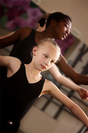 Two young ballet students concentrate in class Stock Photo - Budget Royalty-Free & Subscription, Code: 400-06138340