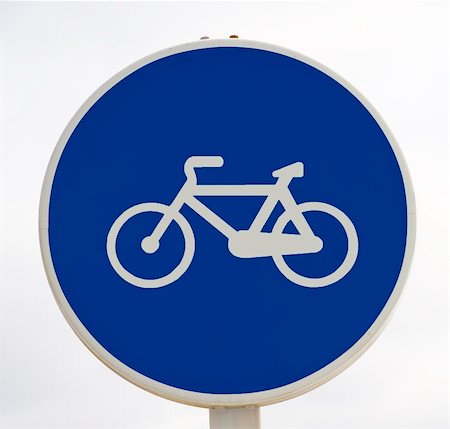 simsearch:400-05355509,k - White bicycle sign in blue background. Road sign bicycle path. Stockbilder - Microstock & Abonnement, Bildnummer: 400-06138393