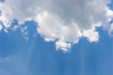 clouds and sun in blue sky in the nature Foto de stock - Super Valor sin royalties y Suscripción, Código: 400-06138446