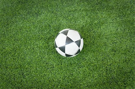 simsearch:400-08372849,k - Black and white soccer ball on Artificial turf football field Stock Photo - Budget Royalty-Free & Subscription, Code: 400-06138589