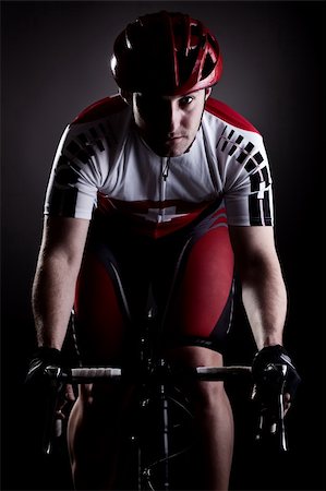fully equipped cyclist riding a bicycle Stock Photo - Budget Royalty-Free & Subscription, Code: 400-06138754
