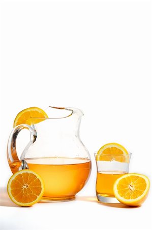 Refresing pitcher of orange fruit drink with fresh sliced orange. Stock Photo - Budget Royalty-Free & Subscription, Code: 400-06138780