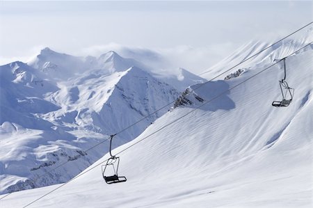 Chair lift at ski resort. Caucasus Mountains, Georgia, Gudauri. Stock Photo - Budget Royalty-Free & Subscription, Code: 400-06138920