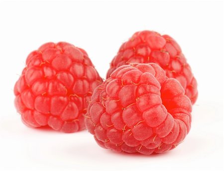 simsearch:400-08020671,k - Arrangement of Fresh Ripe Perfect Raspberry isolated on white background Stock Photo - Budget Royalty-Free & Subscription, Code: 400-06138973