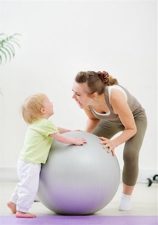 funny wellness healthcare - Mother and kid having fun in gym Stock Photo - Budget Royalty-Free & Subscription, Code: 400-06139225