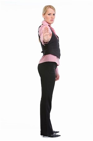 simsearch:400-06635276,k - Full length portrait of employee woman showing stop gesture Photographie de stock - Aubaine LD & Abonnement, Code: 400-06139251