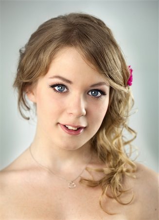 simsearch:400-05127151,k - Studio Portrait of Young Teenager Girl / with hairstyle and light make-up Foto de stock - Super Valor sin royalties y Suscripción, Código: 400-06139519