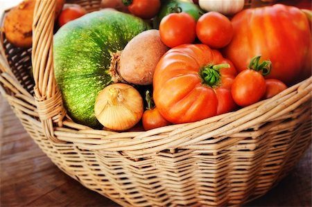 simsearch:400-07212038,k - Freshly harvested summer vegetables in large basket with garden scissors. Pumpkin, large tomatoes, cherry tomatoes, onion, cucumber, garlic and potato Stock Photo - Budget Royalty-Free & Subscription, Code: 400-06139539