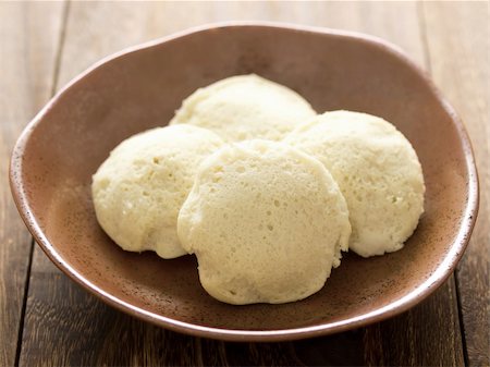 southern asian food - close up of a bowl of indian idlis Stock Photo - Budget Royalty-Free & Subscription, Code: 400-06139582