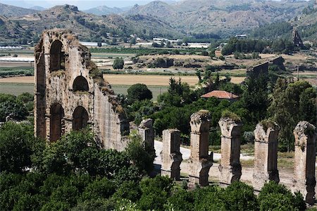 Old water aqueduct device near theater Aspendos in Antalya, archeology background. Constructed by Greece architect Eenon during time of Mark Aurelius Photographie de stock - Aubaine LD & Abonnement, Code: 400-06139676