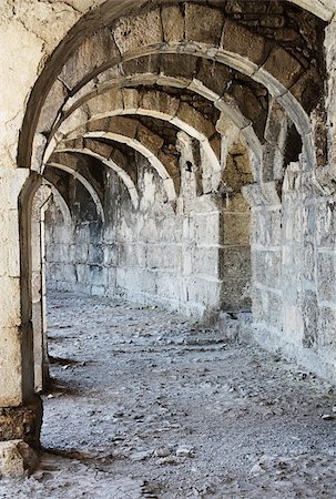 round amphitheatre - Arch corridor ancient amphitheater of Aspendos old ruin, Turkey. Stock Photo - Budget Royalty-Free & Subscription, Code: 400-06139678