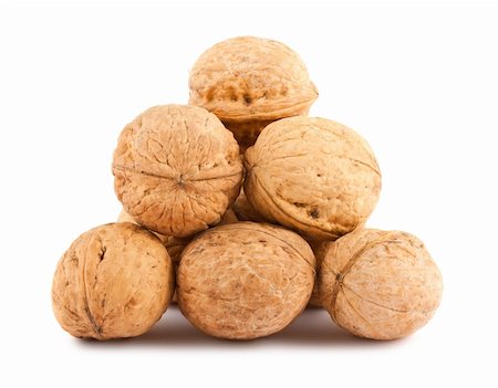 simsearch:400-04415203,k - Heap of ripe walnuts isolated on white background Fotografie stock - Microstock e Abbonamento, Codice: 400-06139889