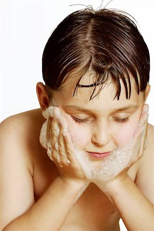 Photo of a child washing his face with soapy suds Stock Photo - Budget Royalty-Free & Subscription, Code: 400-06130562