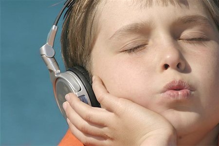 people whistling - A closeup of a child whistling to a tune. Stock Photo - Budget Royalty-Free & Subscription, Code: 400-06131172