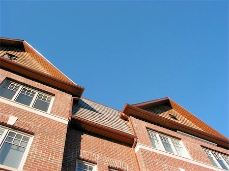 dormir - New brick townhomes on a bright sunny day, space for copy Stock Photo - Budget Royalty-Free & Subscription, Code: 400-06131481