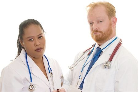 Two doctors - man and woman - diverse.  Focus on man Stock Photo - Budget Royalty-Free & Subscription, Code: 400-06131747
