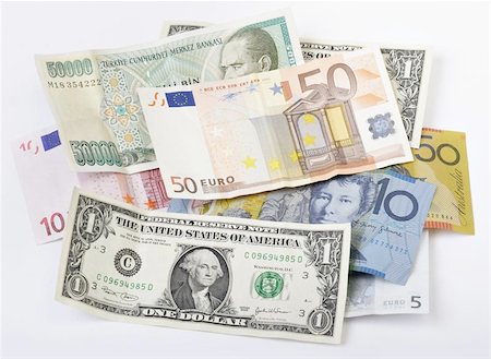 piles of cash pounds - Money stash, multiple currencies Photographie de stock - Aubaine LD & Abonnement, Code: 400-06131974