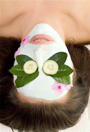 Green tea and cucumber mask facial treatment that promotes vibrant, youthful and healthy looking skin. During the application process, intense moisture and essential antioxidants penetrate the skin. Stock Photo - Budget Royalty-Free & Subscription, Code: 400-06132412