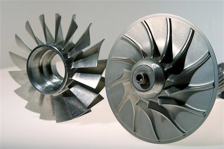 precision engineered turbines with a gray background Stock Photo - Budget Royalty-Free & Subscription, Code: 400-06132644