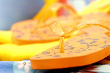 closeup of orange flip flops Stock Photo - Budget Royalty-Free & Subscription, Code: 400-06132640