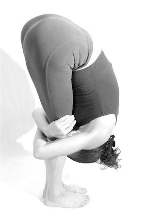A lady showing her flexibility Stock Photo - Budget Royalty-Free & Subscription, Code: 400-06133310