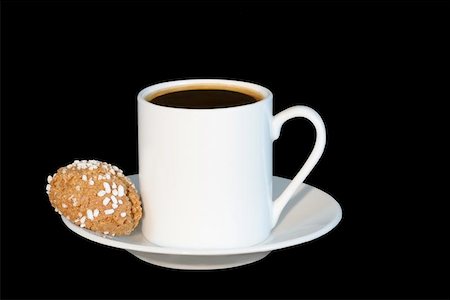 White china espresso coffee cup and biscuit against a black background. Stock Photo - Budget Royalty-Free & Subscription, Code: 400-06133729