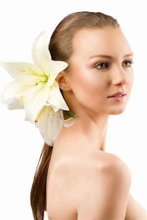 simsearch:400-06096871,k - beauty portait of pretty young girl with lilies, she is turned of three quarters at left and has lilies in her hair Stock Photo - Budget Royalty-Free & Subscription, Code: 400-06140214