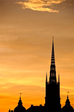 simsearch:400-06692838,k - View of Stockholm old town and Riddarholmen church tower at sunset Stockbilder - Microstock & Abonnement, Bildnummer: 400-06140219