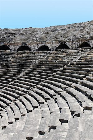 simsearch:400-07038923,k - Old circle theater in Side, archeology background. Constructed by Greece architect during past time. Turkey. Stock Photo - Budget Royalty-Free & Subscription, Code: 400-06140790