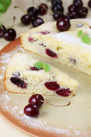 simsearch:400-04709493,k - Delicious homemade sponge cake with black cherries. Shallow DOF Stock Photo - Budget Royalty-Free & Subscription, Code: 400-06140819
