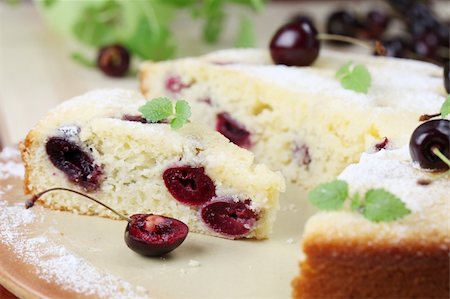 simsearch:400-04709493,k - Delicious homemade sponge cake with black cherries. Shallow DOF Stock Photo - Budget Royalty-Free & Subscription, Code: 400-06140821