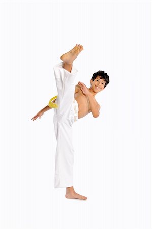 simsearch:400-06140923,k - Child performing Brazilian martial art dance - Capoeira Stock Photo - Budget Royalty-Free & Subscription, Code: 400-06140922