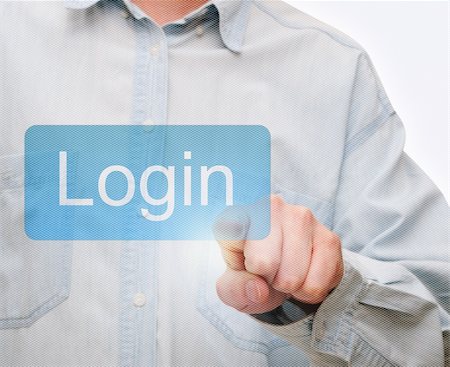 simsearch:400-05681747,k - Man's Hand Pushing Login Button on Touch Screen Stock Photo - Budget Royalty-Free & Subscription, Code: 400-06140931