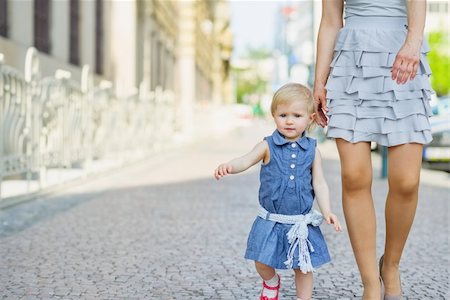 simsearch:400-06086432,k - Baby with mother walking in city Stockbilder - Microstock & Abonnement, Bildnummer: 400-06141179