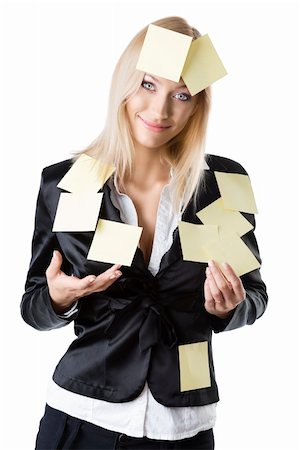 pretty business woman with black jacket and some post-it on her body, she looks in to the lens and smiles Stock Photo - Budget Royalty-Free & Subscription, Code: 400-06141247