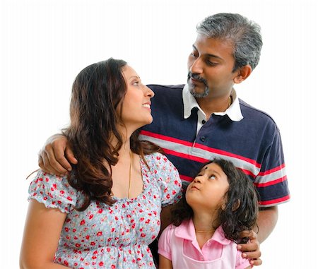 Modern Indian family having conversation on white background Stock Photo - Budget Royalty-Free & Subscription, Code: 400-06141562