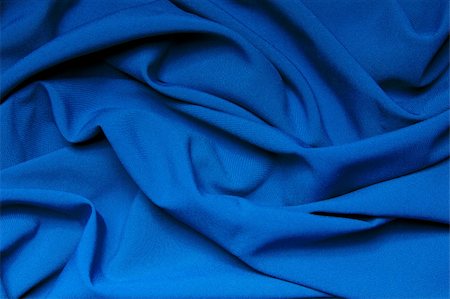 flowing garments - The folds of a bright blue cloth. Abstract Background Stock Photo - Budget Royalty-Free & Subscription, Code: 400-06141928