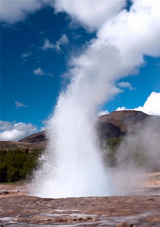 strokkur geyser - Water phase eruption of Strokkur Geyser in Iceland Stock Photo - Budget Royalty-Free & Subscription, Code: 400-06141931