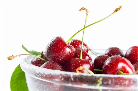 simsearch:400-08110532,k - Fresh ripe cherries in a class bowl close-up isolated on white background. Stock Photo - Budget Royalty-Free & Subscription, Code: 400-06141990