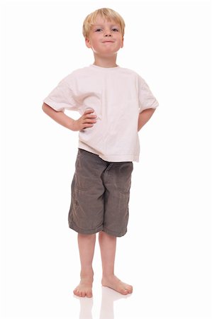 student little child - Happy young boy standing on white background Stock Photo - Budget Royalty-Free & Subscription, Code: 400-06142313