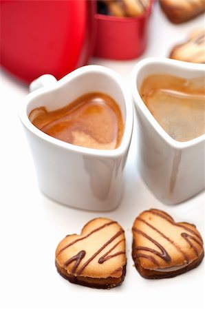 heart shaped cream cookies on red heart metal box and couple of espresso coffee cups Stock Photo - Budget Royalty-Free & Subscription, Code: 400-06142441