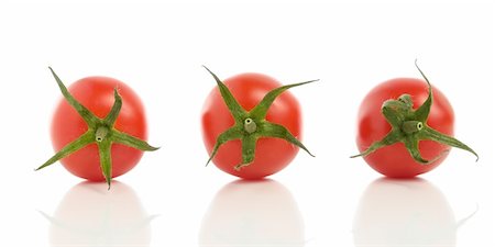 simsearch:400-07113791,k - Three tomatoes with reflection isolated on white background Foto de stock - Royalty-Free Super Valor e Assinatura, Número: 400-06142693