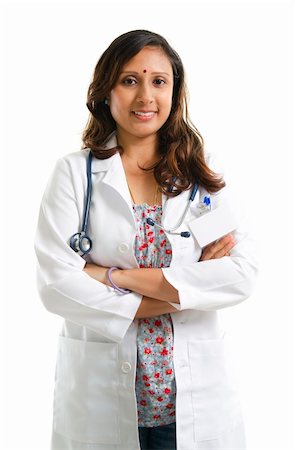 30s Asian Indian female doctor crossed arms over white background Stock Photo - Budget Royalty-Free & Subscription, Code: 400-06142843