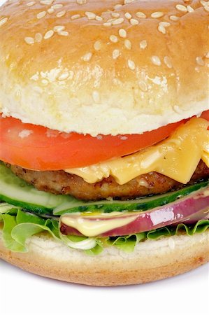 simsearch:400-06330800,k - Tasty Hamburger with beef, tomato, letucce and cheese closeup clipping path Stock Photo - Budget Royalty-Free & Subscription, Code: 400-06143021