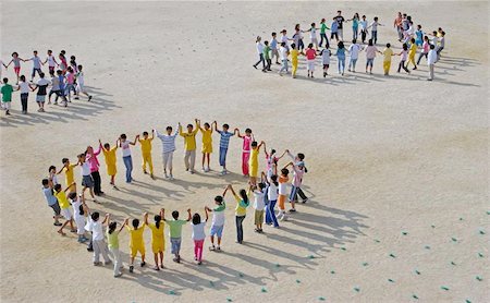 Children dancing in a circle Stock Photo - Budget Royalty-Free & Subscription, Code: 400-06143716