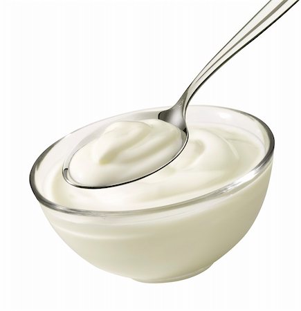 Nice product shot from a bowl and spoon with yoghurt. Stock Photo - Budget Royalty-Free & Subscription, Code: 400-06174033