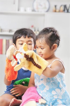 picture boys playing dolls - Children playing hand-made hand puppet at home Stock Photo - Budget Royalty-Free & Subscription, Code: 400-06174052