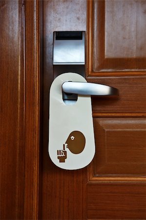 Please don't disturb label at a door handle Stock Photo - Budget Royalty-Free & Subscription, Code: 400-06174152